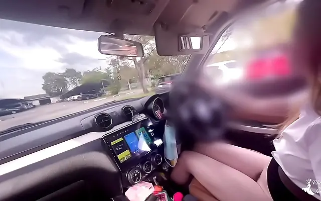 On the car seat a shy Thai student teases herself for a stranger&rsquo;s gaze