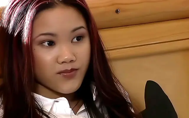 In the gym mirror petite Asian teen Lucy dazzles in fishnets and heels