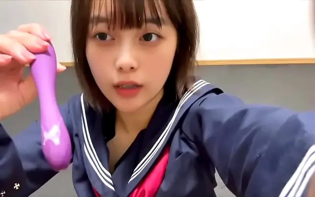 Two Japanese women share intimate vibes in a naughty masturbation swap
