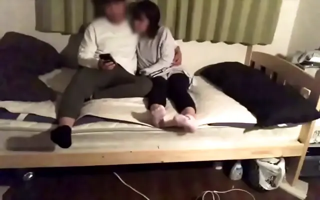 Soft moans filled the dark room as my amateur Japanese girlfriend
