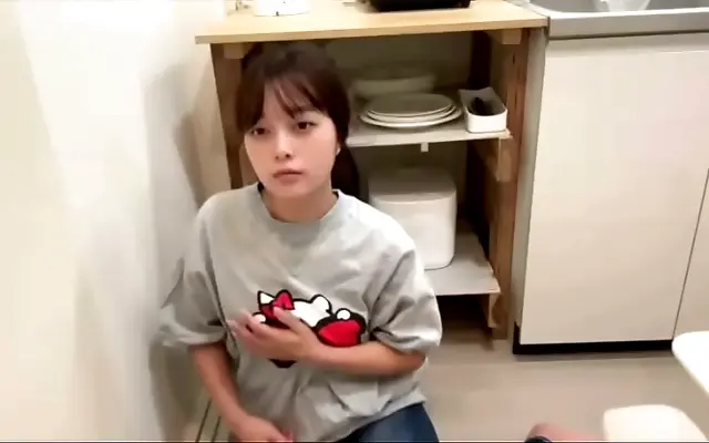 Two college girls explore each other in a steamy kitchen encounter after a night apart