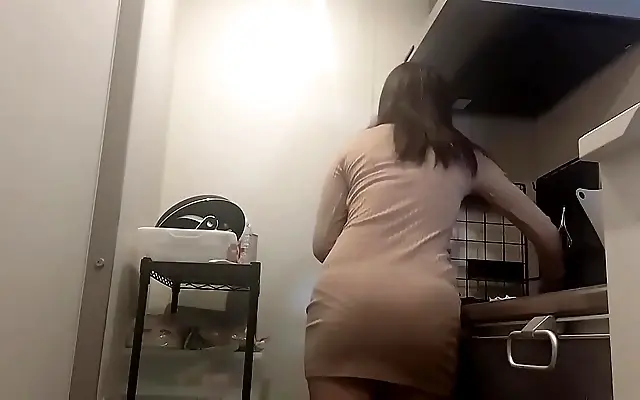 Sapphire blue lingerie in the kitchen teasing her big natural tits and plump ass